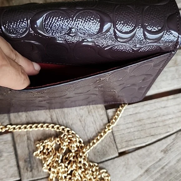 Coach Embossed Brown Crossbody Bag with Gold Chain